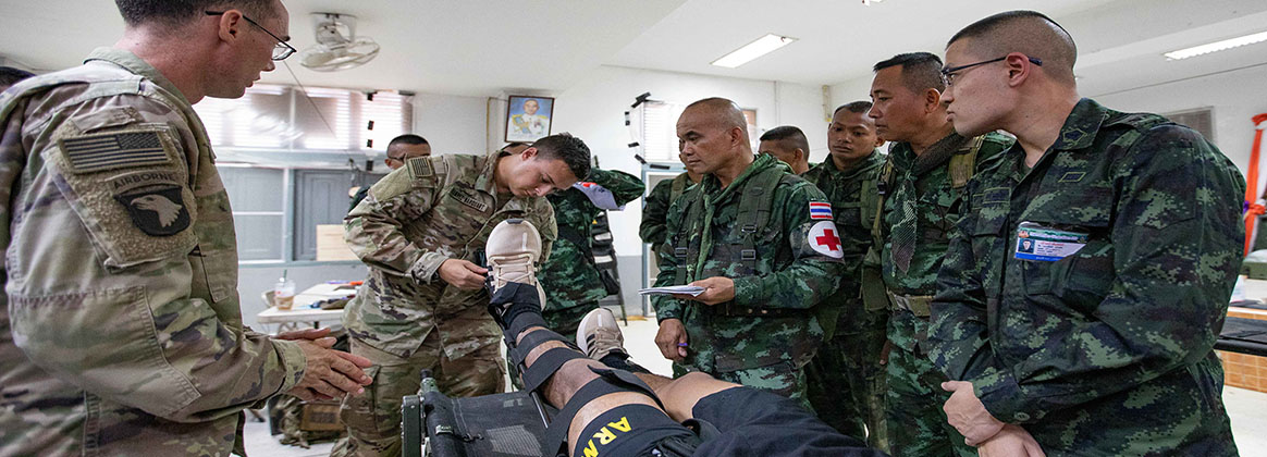 KORAT, Thailand (Mar. 9, 2020) - Soldiers of Medical Platoon, Headquarters and Headquarters Company, 2nd Battalion, 35th Infantry Regiment, 3rd Infantry Brigade Combat Team, 25th Infantry Division conducts a class on the applications of a traction splint and how to apply one on a wounded Soldier to Soldiers from the Royal Thai Army during the Hanuman Guardian Exercise on March 9, 2020, at Camp Friendship, Korat, Thailand. Our relationship with the Kingdom of Thailand remains one of our most important in Southeast Asia. The bilateral training of HG20 demonstrates the commitment of the Kingdom of Thailand and the U.S. to our long-standing alliance. 