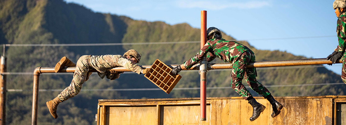 SCHOFIELD BARRACKS, Hawaii (Nov. 16, 2020) Soldiers from the Indonesian 431st Para Raider Battalion and 3rd Squadron, 4th Cavalry Regiment, 3rd Infantry Brigade Combat Team, 25th Infantry Division challenged themselves through a variety of obstacles on a Leadership Reaction Course on the first day of training in Hawaii during the 2020 Indonesia Platoon Exchange on Schofield Barracks, Hawaii on November 16, 2020. 