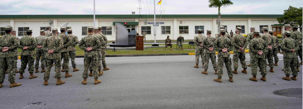 OKINAWA, Japan (Jan. 18, 2022) - U.S. Navy Seabees with Naval Mobile Construction Battalion (NMCB) 3 and NMCB-5 stand at parade rest during a relief in place/transfer of authority (RIP/TOA) ceremony onboard Camp Shields in Okinawa, Jan. 18. This RIP/TOA marked the official completion of NMCB-5's deployment in the region. NMCB-5 is homeported in Port Hueneme, California. The Seabees will train on high-quality construction, expeditionary logistics, and combat operations during the homeport phase. They execute construction and engineering projects to support Major Combat Operations, disaster response, and humanitarian assistance. 