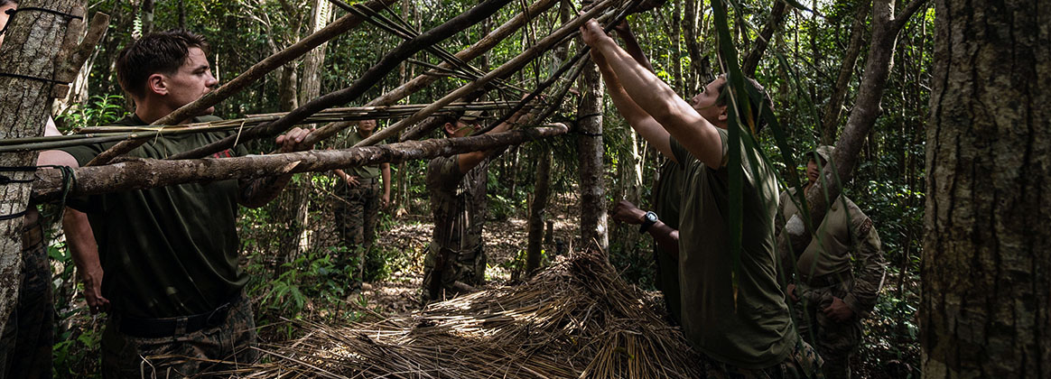 OKINAWA, Japan (June 28, 2022) - U.S. Marines with 3rd Explosive Ordinance Disposal Company, 9th Engineering Support Battalion, 3rd Marine Logistics group, participate in hands-on shelter construction training during Jungle Crab 22 at Jungle Warfare Training Center, Okinawa, Japan, June 28, 2022. During the training, EOD Marines prepared to support Expeditionary Advanced Base Operations by practicing survival methods in areas where logistical support may not be available. 