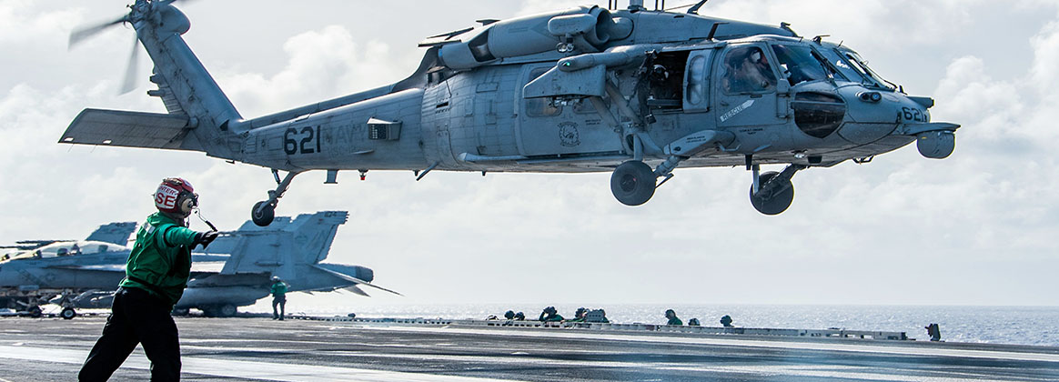 PHILIPPINE SEA (July 1, 2022) - An MH-60S Sea Hawk helicopter attached to the Golden Falcons of Helicopter Sea Combat Squadron (HSC) 12 takes off from the flight deck of the U.S. Navy's only forward-deployed aircraft carrier USS Ronald Reagan (CVN 76). HSC 12, originally established as Helicopter Anti-Submarine Squadron (HS) 2 on March 7, 1952, is the oldest active operational Navy helicopter squadron. Ronald Reagan, the flagship of Carrier Strike Group 5, provides a combat-ready force that protects and defends the United States, and supports alliances, partnerships and collective maritime interests in the Indo-Pacific region. 