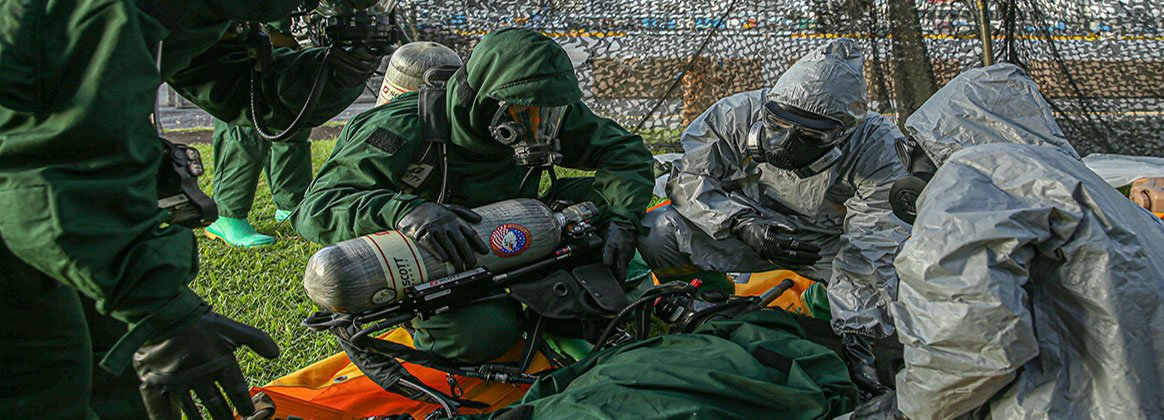 NAHA MILITARY PORT, Japan (Aug. 11, 2022) - U.S. Marine Corps chemical, biological, radiological, and nuclear defense defense specialists from units across III Marine Expeditionary Force conduct decontamination drills during exercise Toxic Bayou at Naha Military Port, Okinawa, Japan, Aug.11, 2022. The Marines conducted exercise Toxic Bayou to refine their skills in Counter Weapons of Mass Destruction operations across unique and challenging environments. 3rd MLG, based out of Okinawa, Japan, is a forward-deployed combat unit that serves as III MEF’s comprehensive logistics and combat service support backbone for operations throughout the Indo-Pacific area of responsibility.