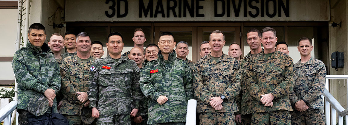 OKINAWA, Japan (Nov. 28, 2022) - U.S. Marine Corps Maj. Gen. Jay M. Bargeron, 3d Marine Division Commanding General and 3d Marine Division staff pose for a group photo with Maj. Gen Im Sunggeun, Republic of Korea 1st Marine Division Commanding General and his staff at Camp Courtney, Okinawa, Japan, Nov. 28, 2022. U.S. and ROK Marines work together routinely to maintain combined proficiency and readiness. 