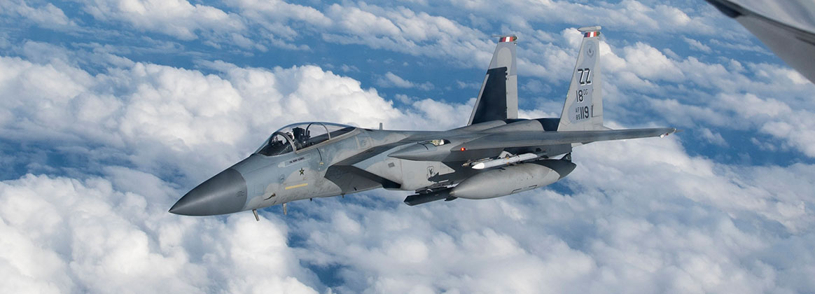 KADENA AIR BASE, Japan (Nov. 30, 2022) - A U.S. Air Force F-15C Eagle assigned to the 18th Wing breaks away from a KC-135 Stratotanker assigned to the 909th Air Refueling Squadron after conducting aerial refueling over the Pacific Ocean, Nov. 30, 2022. The KC-135 delivers global aerial refueling capability to support joint and coalition aircraft throughout the Indo-Pacific region. 