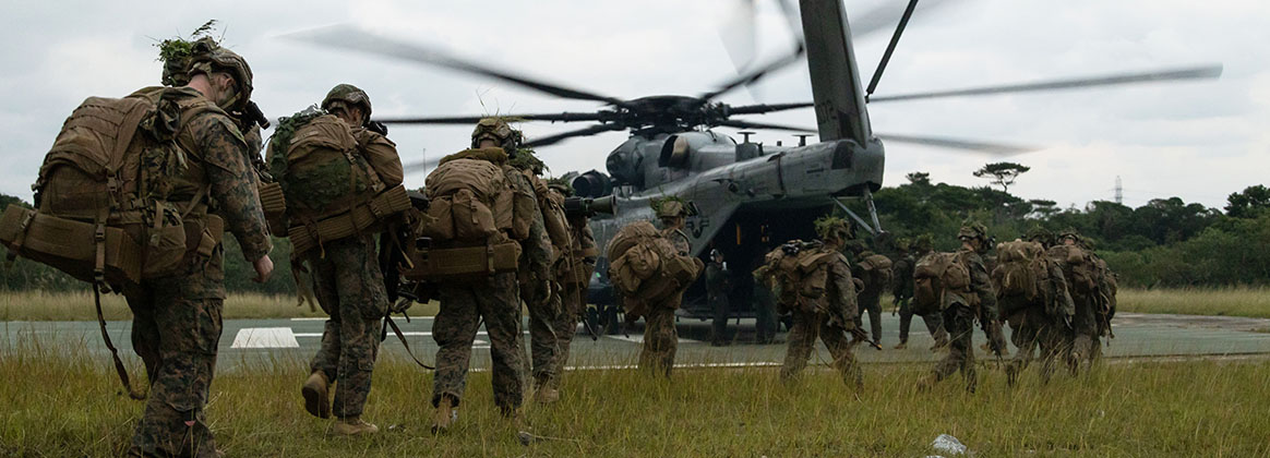 SCHWAB, OKINAWA, Japan (Dec. 7, 2022) – U.S. Marines with 1st Battalion, 2d Marines board a CH-53E Super Stallion helicopter during Stand-in Force Exercise on Okinawa, Japan, Dec. 7, 2022. SiF-EX is a Division-level exercise involving all elements of the Marine Air-Ground Task Force focused on strengthening multi-domain awareness, maneuver, and fires across a distributed maritime environment. This exercise serves as a rehearsal for rapidly projecting combat power in defense of allies and partners in the region. 
