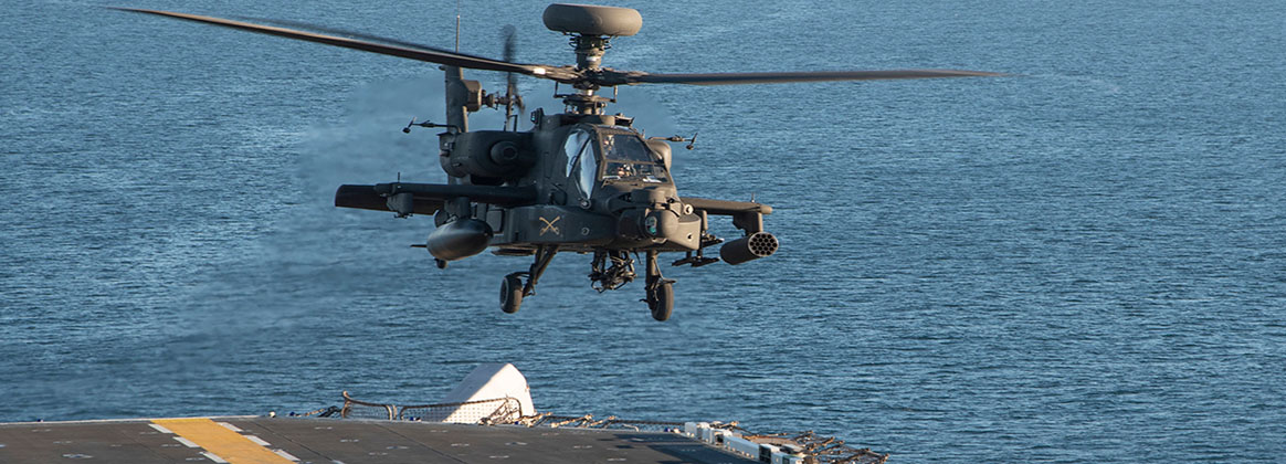 PACIFIC OCEAN (Jan. 25, 2023) – A U.S. Army AH-64 Apache helicopter assigned to the 16th Combat Aviation Brigade lands aboard amphibious assault carrier USS Tripoli (LHA 7) Jan. 25, 2023. Tripoli is underway conducting routine operations in U.S. 3rd Fleet. 