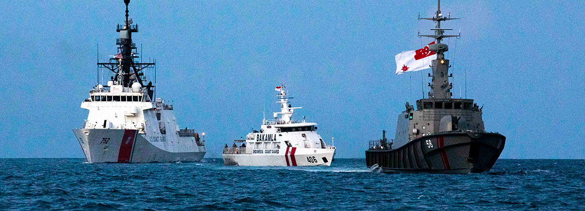 CHINA SEA (May 22, 2023) - U.S. Coast Guard Cutter Stratton (WMSL 752) conducts passing exercises with Indonesian Maritime Security Agency patrol boat KN Belut Laut-406 and Republic of Singapore Navy MSRV Bastion on May 22, 2023. Stratton deployed to the Western Pacific to conduct engagements with regional allies and partner nations, to reinforce a rules-based order in the maritime domain. (U.S. Coast Guard photo by Chief Petty Officer Brett Cote) 
