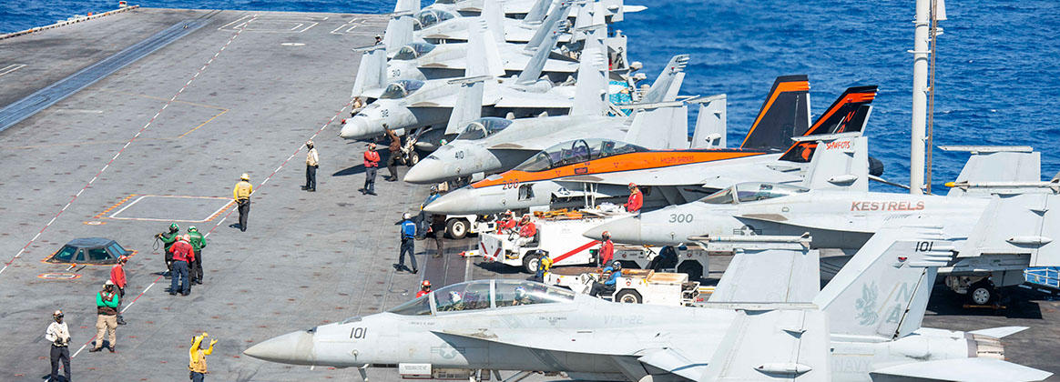 PHILIPPINE SEA (May 24, 2023) - Sailors assigned to the “Warlords” of Helicopter Maritime Strike Squadron (HSM) 51 approach an MH-60R Seahawk helicopter aboard the flight deck of Ticonderoga-class guided-missile cruiser USS Shiloh (CG 67) in the Philippine Sea, May 24. Shiloh is assigned to Commander, Task Force (CTF) 70, and is forward-deployed to Yokosuka, Japan to support the security of the U.S. and its Allies in the Indo-Pacific. 