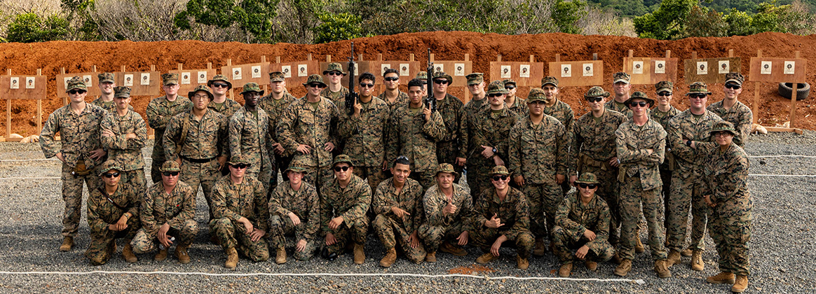230922-M-HG547-2004 NGATPANG, Palau (Sept. 22, 2023) U.S. Marines and Sailors with Task Force Koa Moana 23 pose for a photograph at the conclusion of a range shoot at the Joint Range Complex in Ngatpang, Palau, Sept. 22, 2023. Task Force Koa Moana 23, composed of U.S. Marines and Sailors from I Marine Expeditionary Force, deployed to the Indo-Pacific to strengthen relationships with Pacific Island partners through bilateral and multilateral security cooperation and community engagements. (U.S. Marine Corps photo by Staff Sgt. Courtney G. White) 