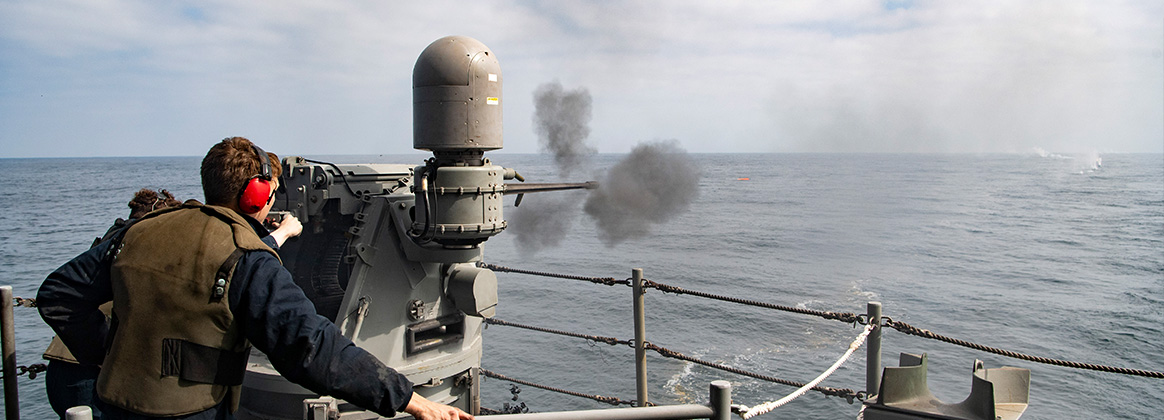 230922-N-MJ302-1690 U.S. Navy Sailors fire a Mark 38 25mm machine gun during a live-fire training exercise on the fantail aboard the aircraft carrier USS Nimitz (CVN 68) while underway in the Pacific Ocean Sept. 22, 20230. Nimitz is underway conducting routine operations. (U.S. Navy photo by Mass Communication Specialist 2nd Class David Rowe) 