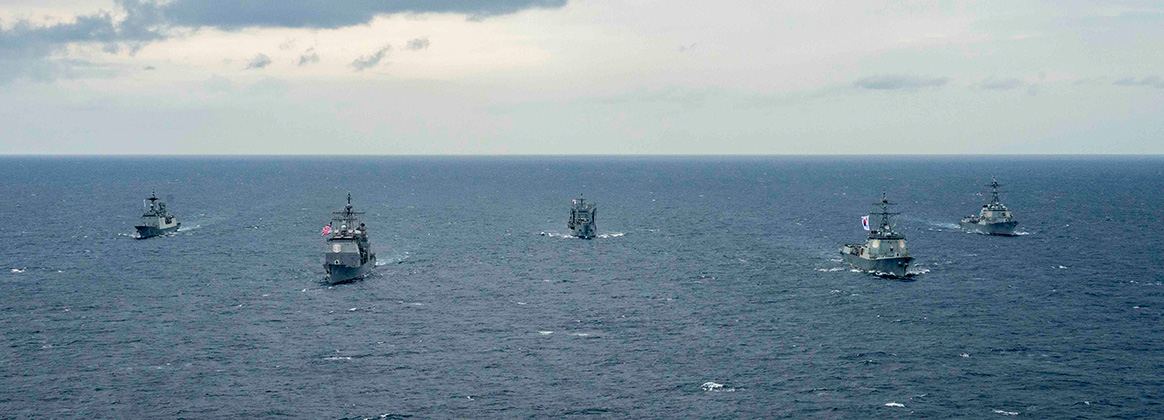 From left, the Chungmugong Yi Sunshin-class helicopter destroyer ROKS Dae Joyeung (DDG 997), Ticonderoga-class guided-missile cruiser USS Robert Smalls (CG 62), first-in-class fast-combat support ship ROKS Cheonji (AOE 57), Sejong the Great-class guided-missile destroyer ROKS Yulgok Yi I (DDG 992), and Arleigh Burke-class guided-missile destroyer USS Shoup (DDG 86) operate in formation during a bilateral exercise on Sept. 25. Robert Smalls and Shoup are assigned to Commander, Task Force 70 and are participating in a multi-domain bilateral exercise with the Republic of Korea Navy in the U.S. 7th Fleet area of operations. The exercise is taking place near the 70th anniversary of the U.S. and Republic of Korea’s Oct. 1, 1953 Mutual Defense Treaty. (U.S. Navy photo by Naval Air Crewman (Helicopter) 2nd Class Timothy Fortin) 