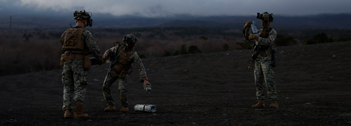 231204-M-CG913-1010 COMBINED ARMS TRAINING CENTER CAMP FUJI, Japan (Dec. 4, 2023) U.S. Marines with 2d Battalion, 7th Marine Regiment simulate rigging cratering charges during Stand-in Force Exercise 24 at Combined Arms Training Center Camp Fuji, Japan, Dec. 4, 2023. SIFEX 24 is a division-level exercise involving all elements of the Marine Air-Ground Task Force focused on strengthening multi-domain awareness, maneuver, and fires across a distributed maritime environment. This exercise serves as a rehearsal for rapidly projecting combat power in defense of allies and partners in the region. (U.S. Marine Corps photo by Cpl. Scott Aubuchon)