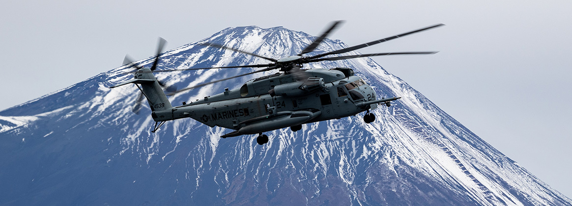 231205-M-MO098-1323 COMBINED ARMS TRAINING CENTER CAMP FUJI, Japan (Dec. 5, 2023) A U.S. Marine Corps CH-53E Super Stallion assigned to Marine Heavy Helicopter Squadron (HMH) 466 conducts flight operations during Stand-in Force Exercise 24 over Combined Arms Training Center Camp Fuji, Japan, Dec. 5, 2023. SIFEX 24 is a division-level exercise involving all elements of the Marine Air-Ground Task Force focused on strengthening multi-domain awareness, maneuver, and fires across a distributed maritime environment. (U.S. Marine Corps photo by Cpl. Kyle Chan)