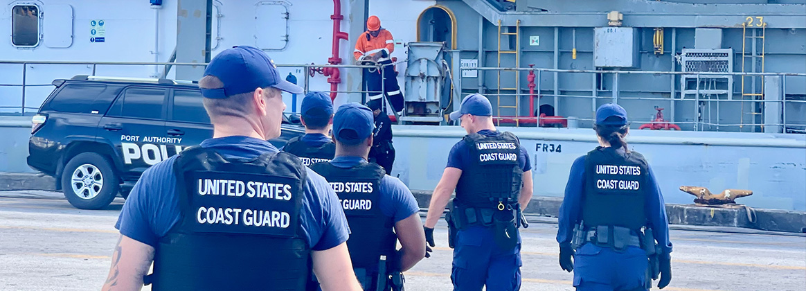 231206-G-G0020-1318 PITI, Guam (Dec. 6, 2023) A U.S. Coast Guard Sector Boarding Team, a key component of U.S. Coast Guard Forces Micronesia/Sector Guam, conducts a thorough security boarding of the 380-foot (116-meter) motor vessel Papa Mau, flagged from Antigua Barbuda, at the Port of Guam on Dec. 6, 2023. This general cargo vessel, arriving from Pohnpei in the Federated States of Micronesia (FSM), was meticulously inspected upon reaching Guam and found to be in full compliance. (U.S. Coast Guard photo by Lt. Brian Maffucci)