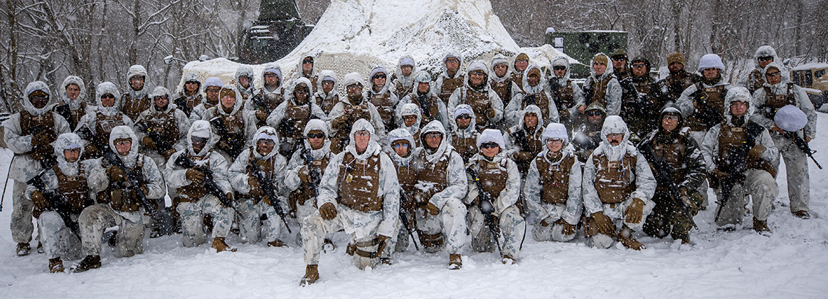 240205-M-TT434-1398 CAMP FUJI, SHIZUOKA, Japan (Feb. 5, 2024) U.S. Marines with Combat Logistics Regiment 3, 3rd Marine Logistics Group, pose for a photo during exercise Winter Workhorse 24 on Combined Arms Training Center Camp Fuji, Japan, Feb. 5, 2024. Winter Workhorse is a regularly scheduled training exercise that is designed to enhance warfighting capabilities in contested environments. (U.S. Marine Corps photo by Sgt. Christian M. Garcia)