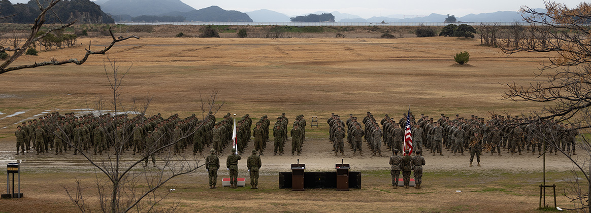 240225-M-MJ391-1050 CAMP AINOURA, SASEBO, NAGASAKI, Japan (Feb. 25, 2024) Japan Ground Self Defense Force service members with 2nd Amphibious Rapid Deployment Regiment, left, stand in formation alongside U.S. Marines with the 31st Marine Expeditionary Unit, during the opening ceremony of Iron Fist 24, on Camp Ainoura, Sasebo, Japan, Feb. 25, 2024. The opening ceremony initiated training between the two armed forces with remarks from their commanding officers. Iron Fist is an annual bilateral exercise designed to increase interoperability and strengthen the relationships between the U.S. Marine Corps, the U.S. Navy, the Japanese Ground Self Defense Force, and the Japanese Maritime Self-Defense Force. (U.S. Marine Corps photo by Cpl. Christopher Lape)